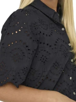 Chemisier en coton noir uni avec une coupe droite et un col à revers