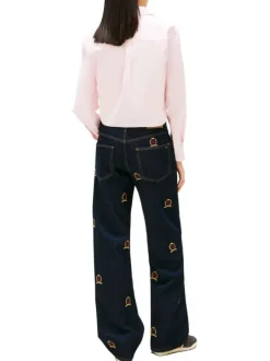 Chemisier en coton rose uni avec une coupe droite et un col à revers
