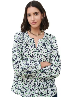 Chemisier marine à motifs floraux avec une coupe droite et un col v