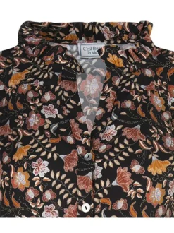 Chemisier noir fleuri avec une coupe ample un col v ruffle et des manche 3/4