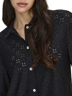 Chemisier noir uni avec une coupe droite et un col à revers