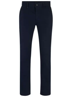 Chino en coton bleu marine uni avec une coupe slim fit et des passants