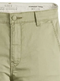 Chino en coton mélangé vert uni à coupe slim avec une taille intermédiaire