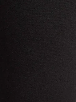 Chino noir uni avec une coupe slim et une fermeture zippée à bouton