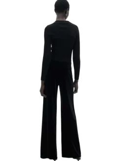Chino noir uni en velours avec une coupe bootcut et fermeture zippée