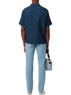 Chino 5 poches en coton bleu uni avec une coupe slim fit et une taille mi-haute