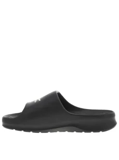 Claquettes noires avec logo de la marque embossé sur la bride