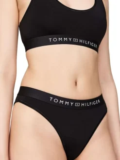 Culotte bikini noire unie avec surpiqûres noire et taille élastiquée