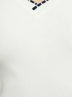 Débardeur en coton blanc uni pourvu d'une coupe ajustée et d'un décolleté en V