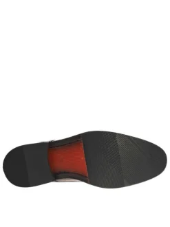 Derbies en cuir cognac avec un talon plat et des lacets ronds