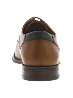 Derbies en cuir marrons avec le nom de la marque embossé et à lacets ronds