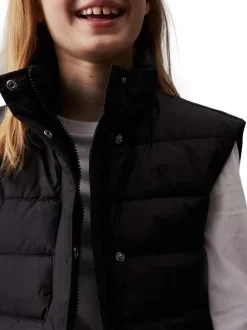 Doudoune en coton régénératif noire unie avec une coupe droite et un col montant