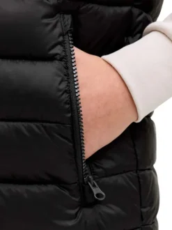 Doudoune sans manches noire pourvue d'une coupe droite et d'un col montant