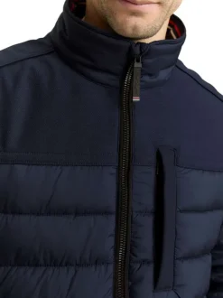 Doudoune marine uni avec une coupe droite et des poches zippées