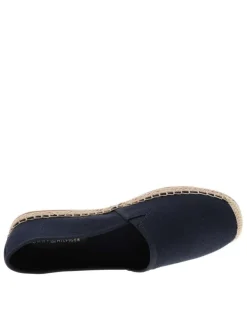 Espadrilles bleu marine avec un talon plat et un petit soufflet élastiqué