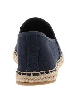 Espadrilles bleu marine avec un talon plat et un petit soufflet élastiqué