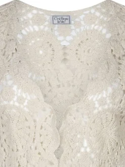 Gilet beige en maille ajourée en coton avec une coupe droite et un col v