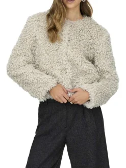 Gilet beige en maille sherpa pourvu d'un col rond et de manches longues