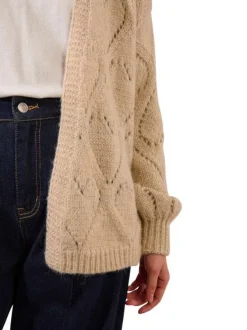 Gilet beige en maille tricotée ajourée avec une coupe droite et un col v