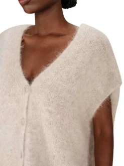 Gilet beige en maille tricotée avec une coupe ample et un col v