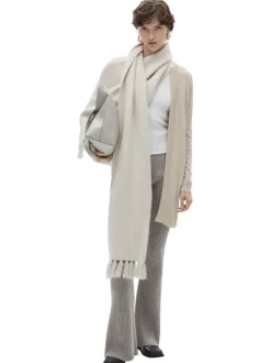 Gilet beige uni avec une coupe droite et des manches longues