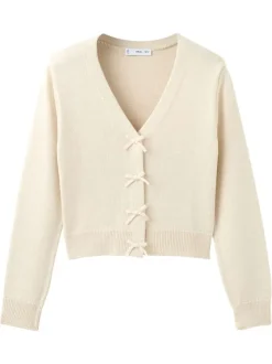 Gilet beige uni avec une coupe droite et des manches longues