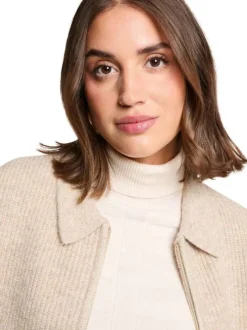 Gilet beige uni avec une coupe droite et un col à revers avec zip