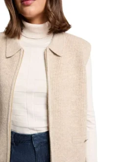 Gilet beige uni avec une coupe droite et un col à revers avec zip