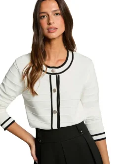 Gilet blanc uni avec une coupe droite et des manches longues