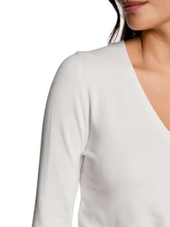 Gilet blanc uni à coupe droite avec un col v et des manches longues