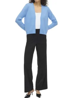 Gilet bleu uni court avec une coupe droite et des manches longues