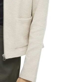 Gilet court écru uni en coton biologique mélangé avec une coupe droite
