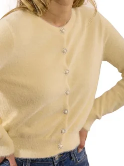 Gilet écru en maille fine avec une coupe droite et des manches longues