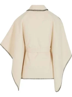 Gilet écru uni pourvu d'un col tailleur et de manches longues