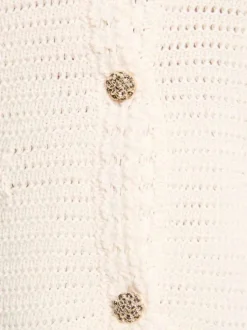 Gilet en coton écru uni pourvu d'une coupe droite et d'un col en V
