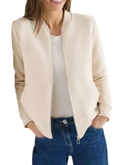 Gilet en coton mélangé beige uni pourvu d'une coupe droite et d'un col montant