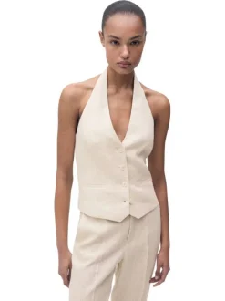 Gilet en lin beige clair uni dos nu fermé par des boutons à col v