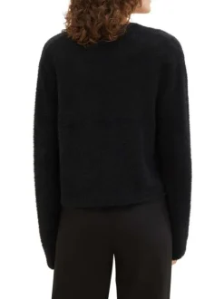 Gilet noir uni avec une coupe droite et un tissu en fausse fourrure
