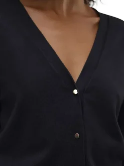 Gilet noir uni à coupe droite avec un col v et des manches longues