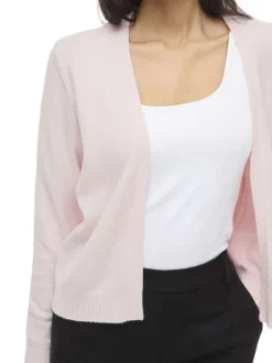 Gilet rose uni court avec une coupe droite et des manches longues