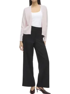 Gilet rose uni court avec une coupe droite et des manches longues