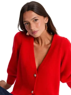 Gilet rouge en maille tricotée pourvu d'un col v et de manches longues