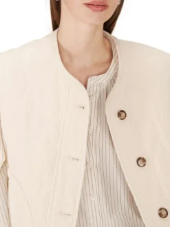 Gilet réversible en coton écru en velours avec une coupe droite et un col rond