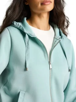 Gilet vert d'eau à coupe droite pourvu d'un col à capuche et de manches longues