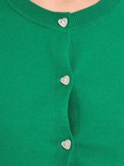 Gilet vert uni pourvu de manches longues et d'une coupe droite