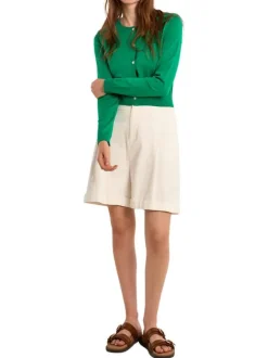 Gilet vert uni pourvu de manches longues et d'une coupe droite