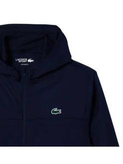 Imperméable à capuche marine avec une coupe droite et un col montant