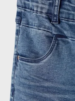 Jean bleu effet délavé à 4 poches coupe slim