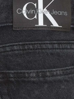 Jean cargo noir délavé en coton recyclé avec une coupe dad et à 6 poches