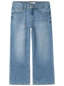 Jean en coton bleu légèrement délavé à taille basse avec une coupe large